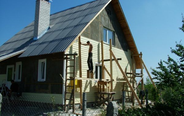 Обшивка каркасного дома 121 м2 сайдингом